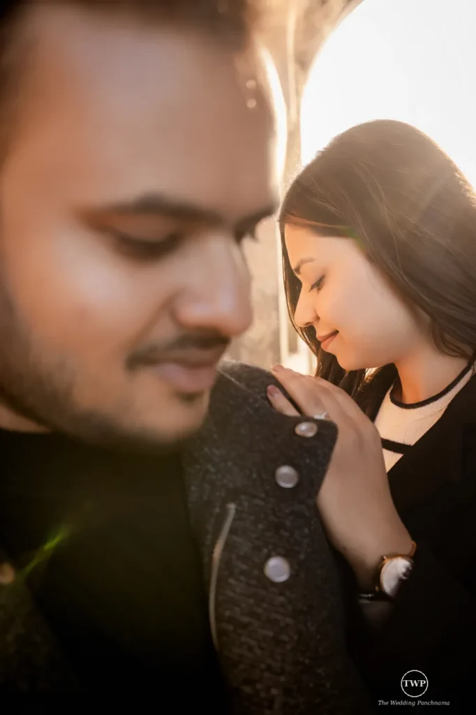Close portrait of a couple in warm evening light at a heritage location near Indore
